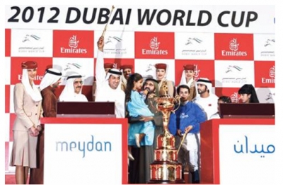 H.H. Sheikh Mohamed Bin Rashid receives Dubai World Cup from H.H. Sheikh Hamdan Bin Rashid